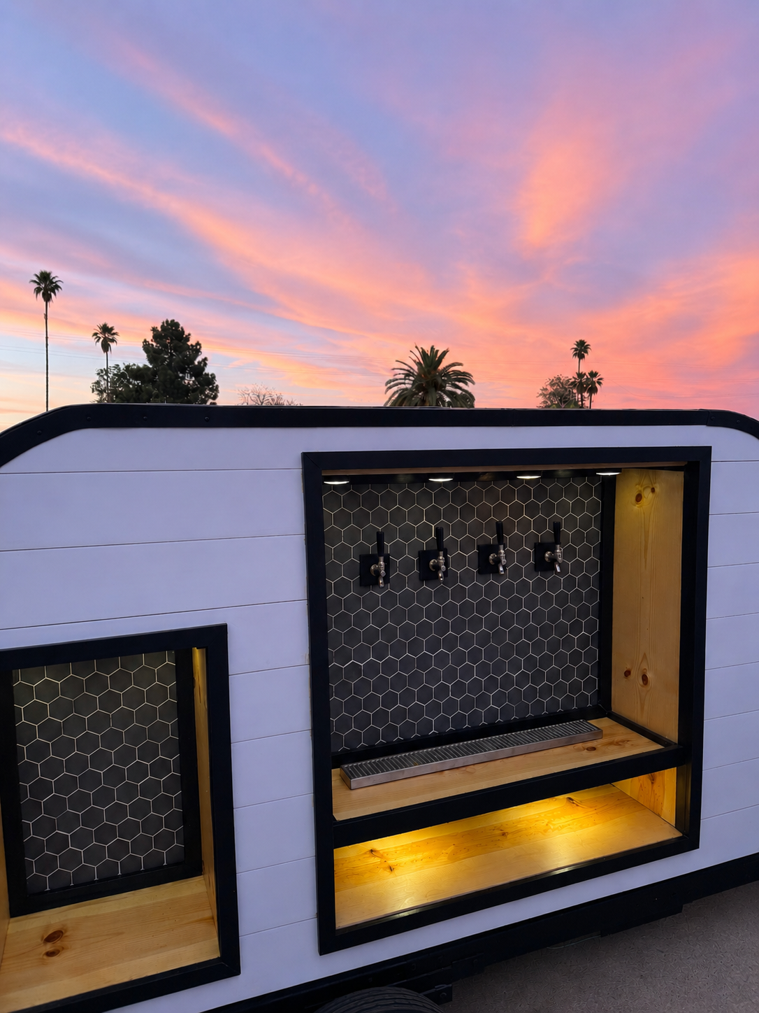 The Tapped Trailer beneath an Arizona sunset